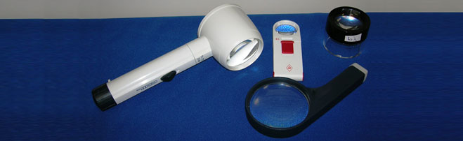 Handheld magnifiers for visually impaired individuals