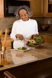 Independent Living Skills for the Visually Impaired Woman making salad